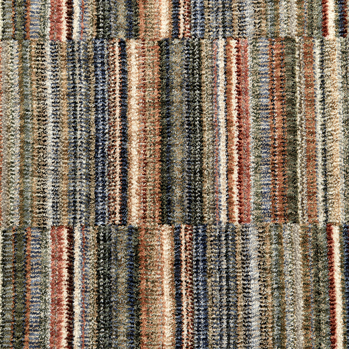 Multi-colored modern rug with bold vertical stripes in earthy tones and textured polyester pile.