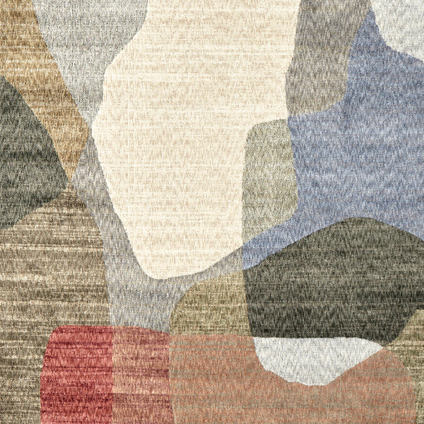 Tanami 336 rug with abstract modern patchwork in muted beige, blue, olive, brown, and rust tones.
