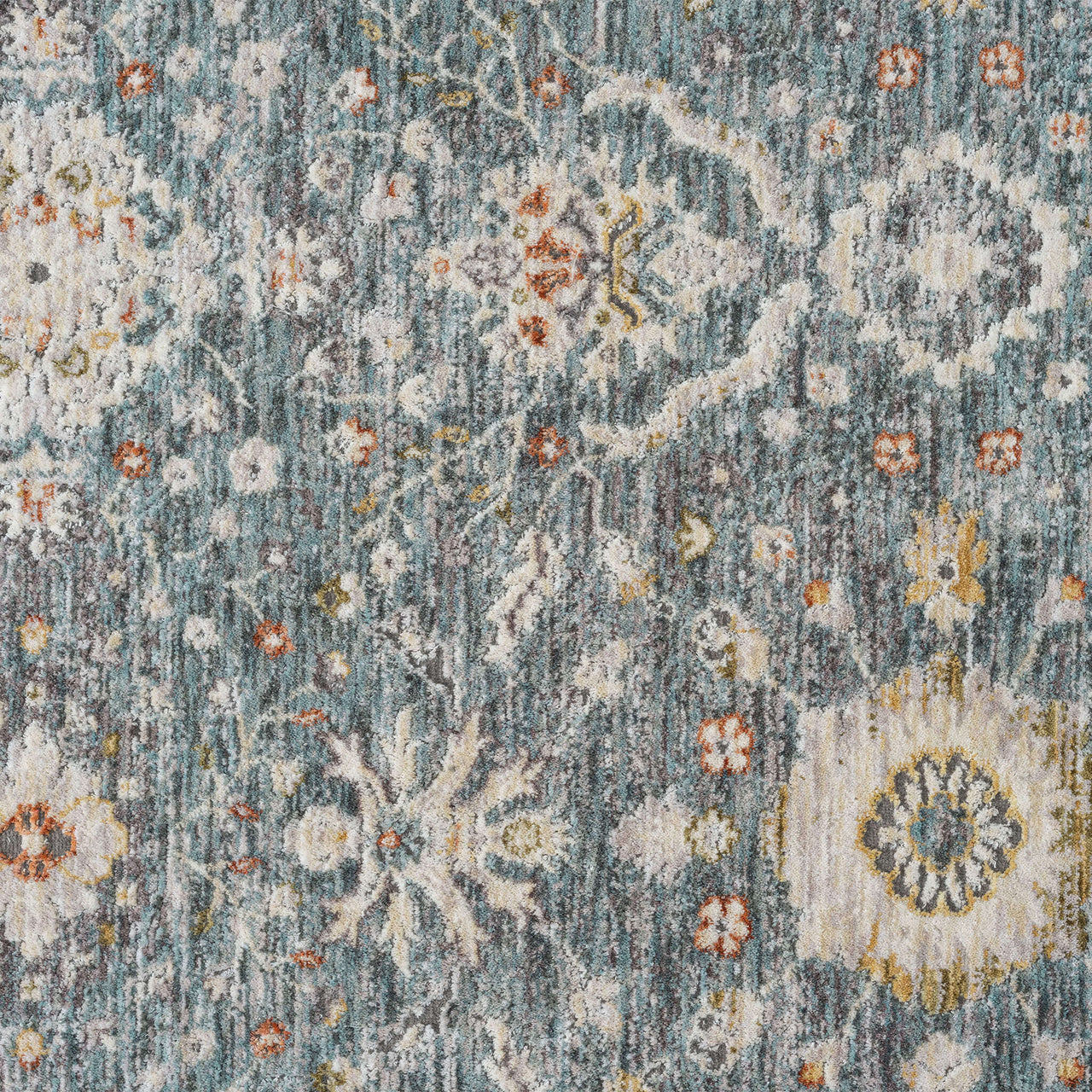 Blue transitional runner rug with multi-colored floral and geometric patterns, textured polyester weave.