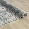 Blue transitional runner rug with intricate floral patterns and soft textured polyester weave.