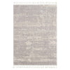 Grey geometric textured modern rug with subtle abstract pattern and white tassels on short edges.