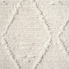 Beige geometric textured runner rug with diamond patterns and plush polyester pile.