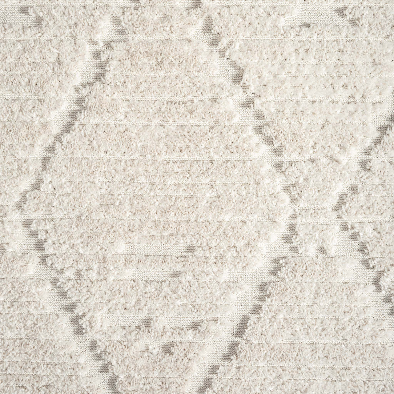 Beige geometric textured runner rug with diamond patterns and plush polyester pile.
