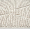 Beige runner rug with raised geometric textured pattern and soft pile.