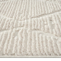 Beige runner rug with raised geometric textured pattern and soft pile.