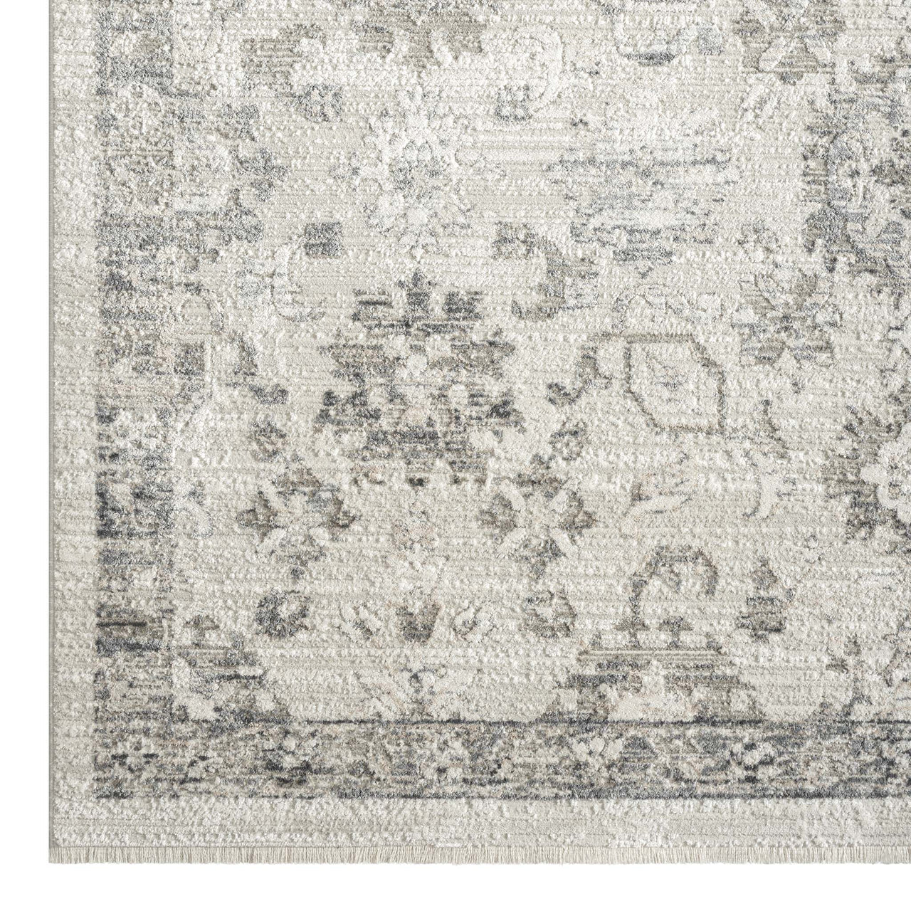 Cream and grey patterned runner rug with distressed vintage style and geometric motifs.