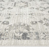 Modern cream and grey patterned runner rug with subtle distressed floral motifs and textured weave.