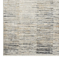Modern neutral-toned rug with abstract linear pattern in light beige and gray hues.