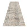 Long modern runner rug with neutral beige, gray, and cream geometric pattern and subtle texture.
