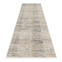 Long modern runner rug with neutral beige, gray, and cream geometric pattern and subtle texture.