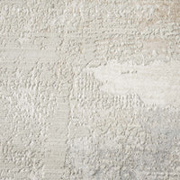 Light neutral runner rug with abstract textured pattern and subtle tonal variations.
