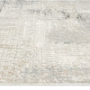 Modern runner rug with abstract neutral pattern in shades of beige, cream, and light gray.