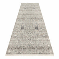 Long neutral-toned runner rug with intricate modern floral and geometric patterns in soft grays and beiges.