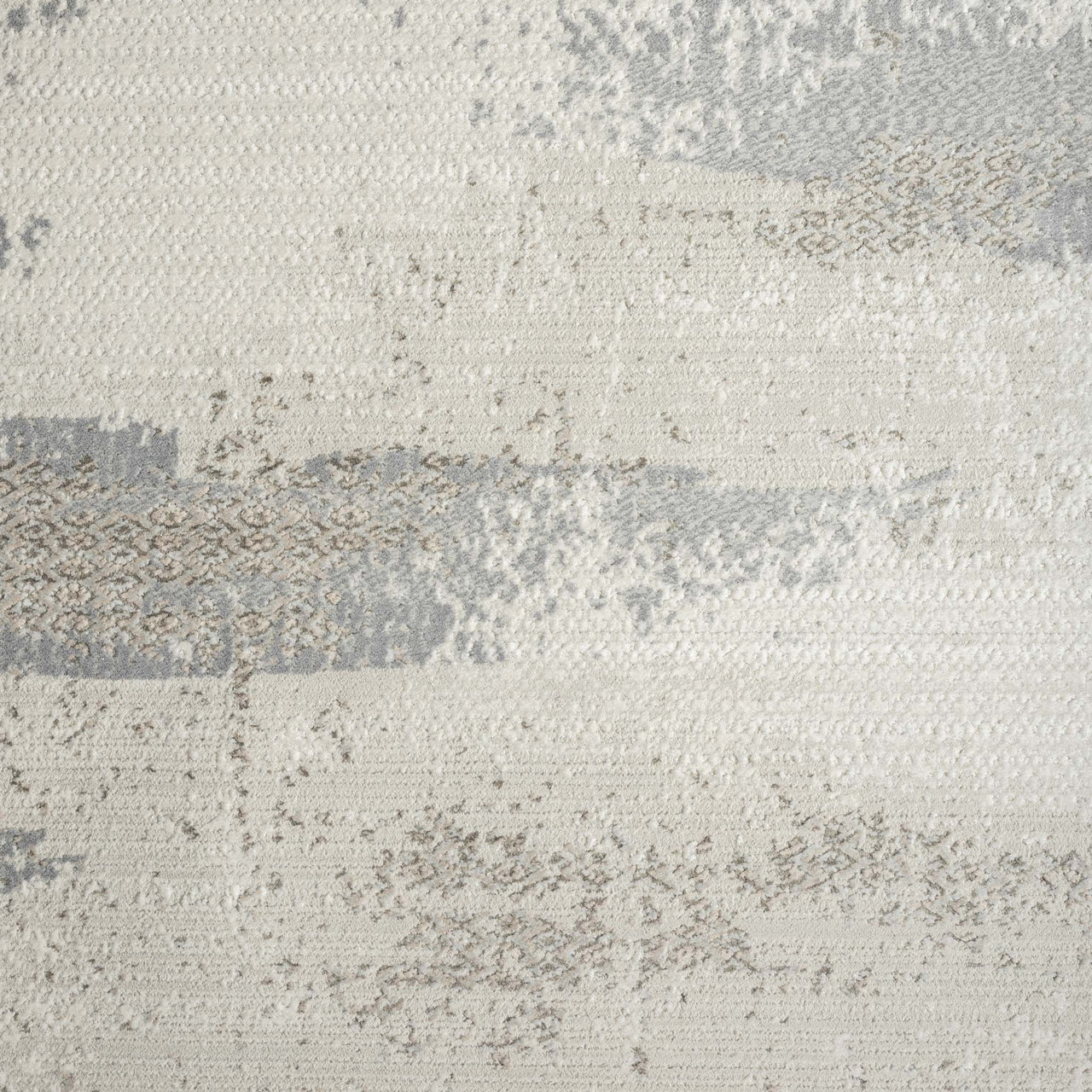 Light neutral runner rug with abstract modern pattern in shades of gray and beige, flat woven texture.