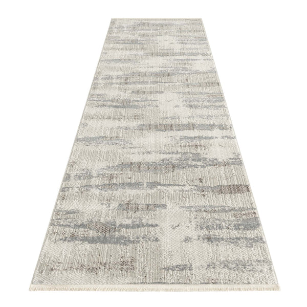 Neutral-toned modern runner rug with abstract light gray and beige pattern.