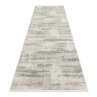 Neutral-toned modern runner rug with abstract light gray and beige pattern.
