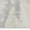 Neutral-toned runner rug with textured modern abstract pattern in soft gray and beige hues.