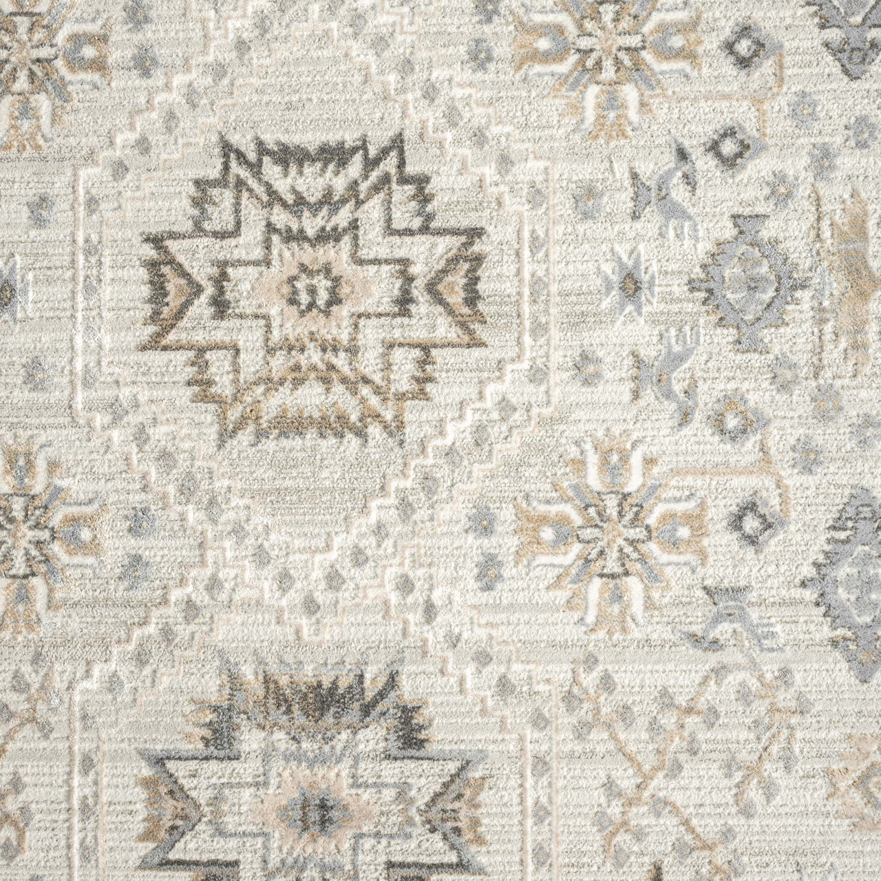 Neutral-toned runner rug with geometric and starburst patterns in beige, gray, and taupe hues.