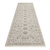 Neutral-toned runner rug with intricate geometric and floral patterns in soft beige and gray shades.