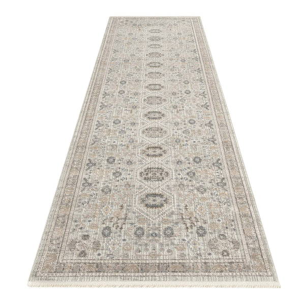Neutral-toned runner rug with intricate geometric and floral patterns in soft beige and gray shades.