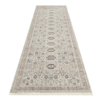 Neutral-toned runner rug with intricate geometric and floral patterns in soft beige and gray shades.