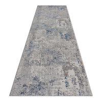 Grey and blue abstract patterned modern runner rug with textured low-shed polyester fibers.