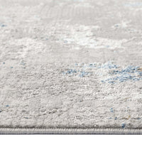 Grey-blue multi-color patterned modern runner rug with subtle abstract design and low pile texture.