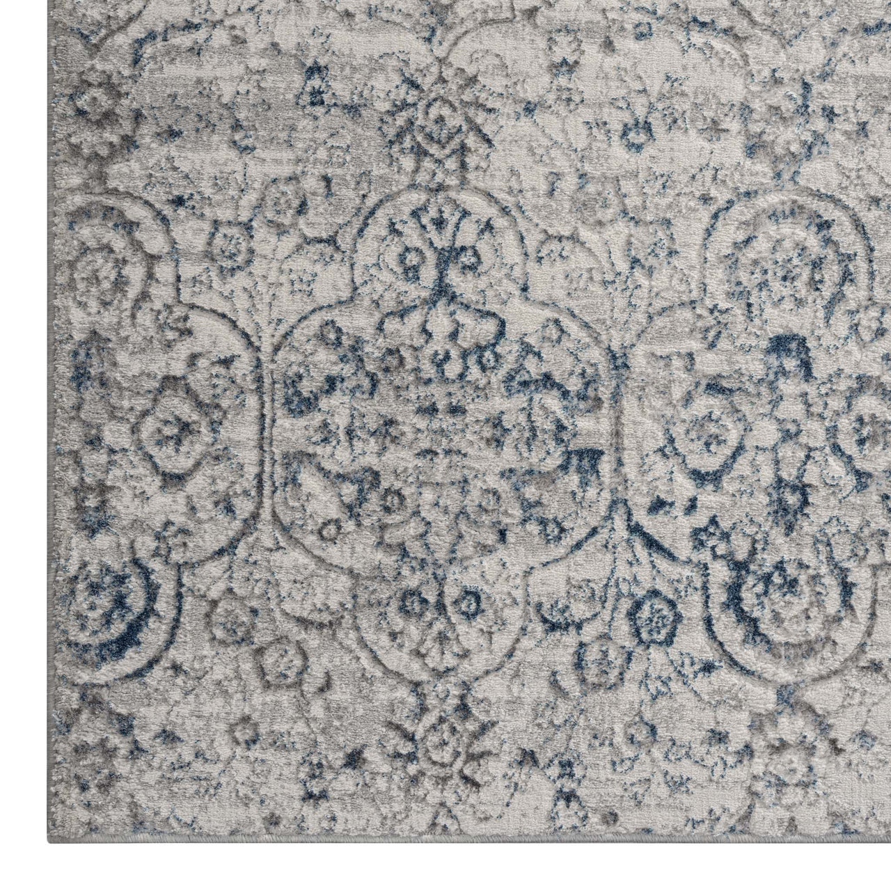 Grey blue runner rug with intricate multi-color abstract floral pattern and textured pile.