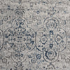 Grey blue runner rug with intricate modern floral and geometric patterns.
