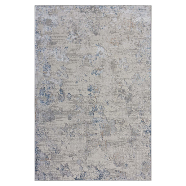 Grey patterned modern rug with abstract distressed design and subtle blue accents.