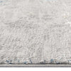 Grey patterned modern rug with subtle texture and low pile, close-up detail.