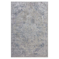 Grey blue modern rug with subtle abstract pattern and textured design.