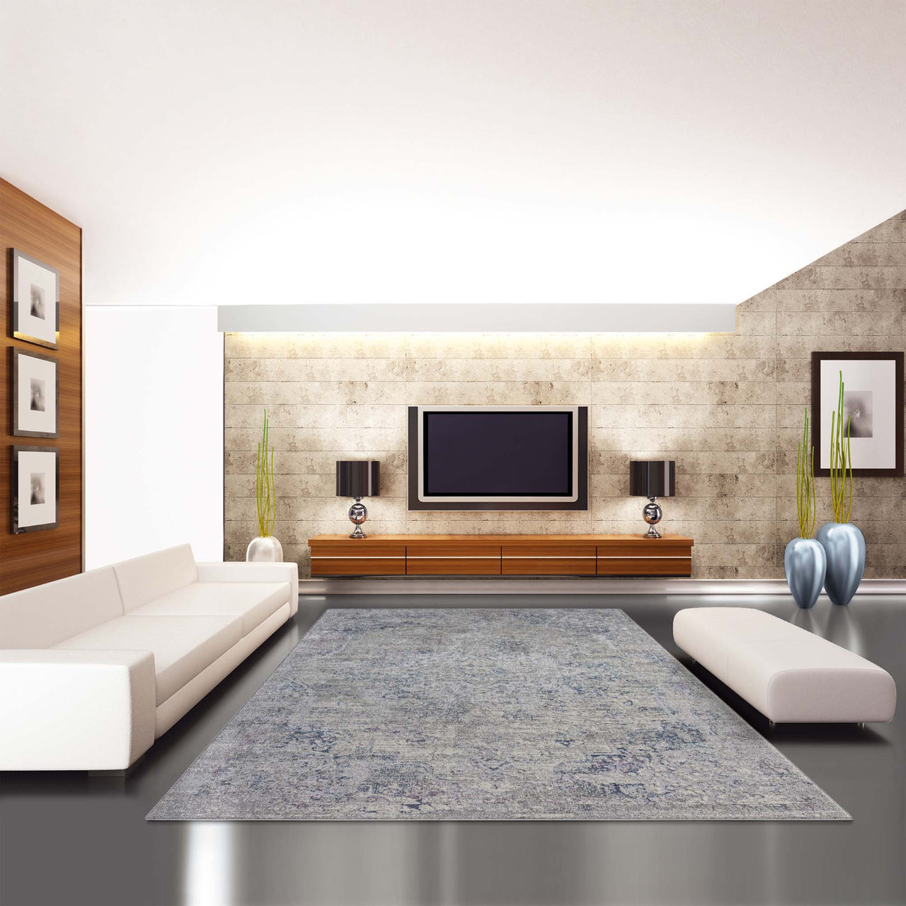 Grey-blue modern rug with subtle abstract pattern in minimalist living room setting.