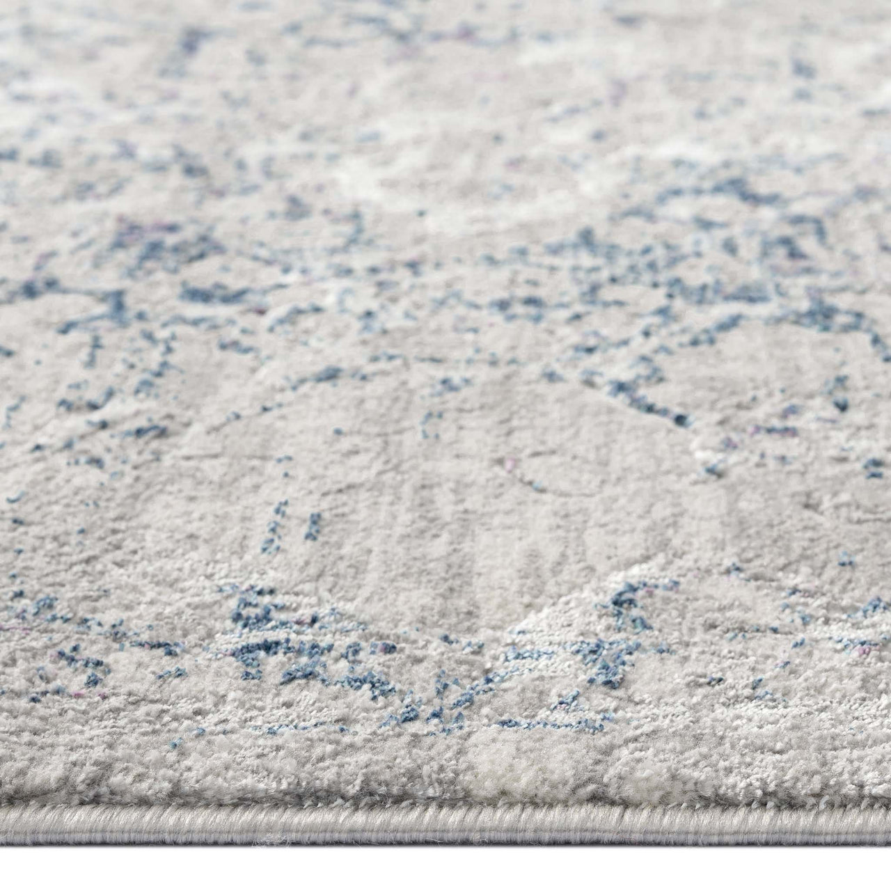 Grey blue patterned power-loomed modern rug with subtle textured design and soft polyester fibers.