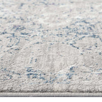 Grey blue patterned power-loomed modern rug with subtle textured design and soft polyester fibers.