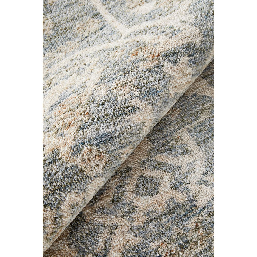 Textured rug with geometric pattern.