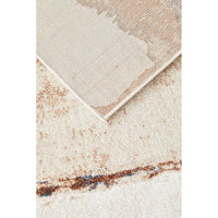 Beige area rug with a textured pattern.