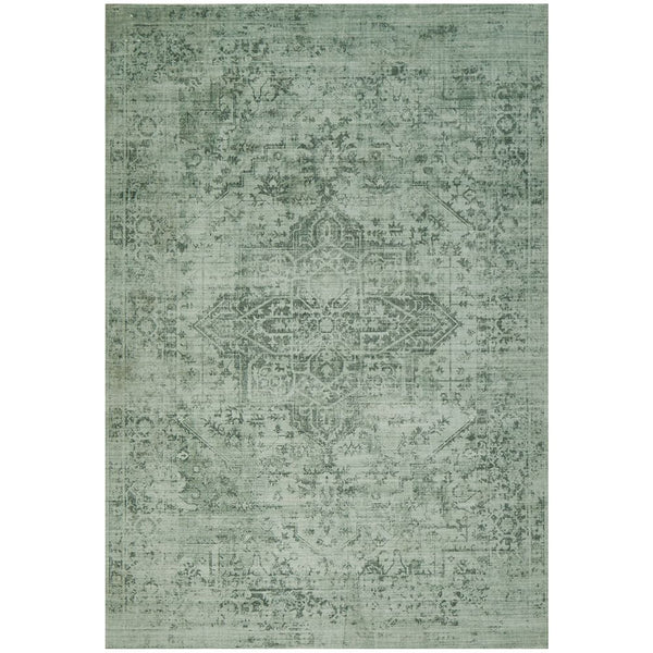 Emerald green modern rug with subtle distressed pattern and soft polyester texture.