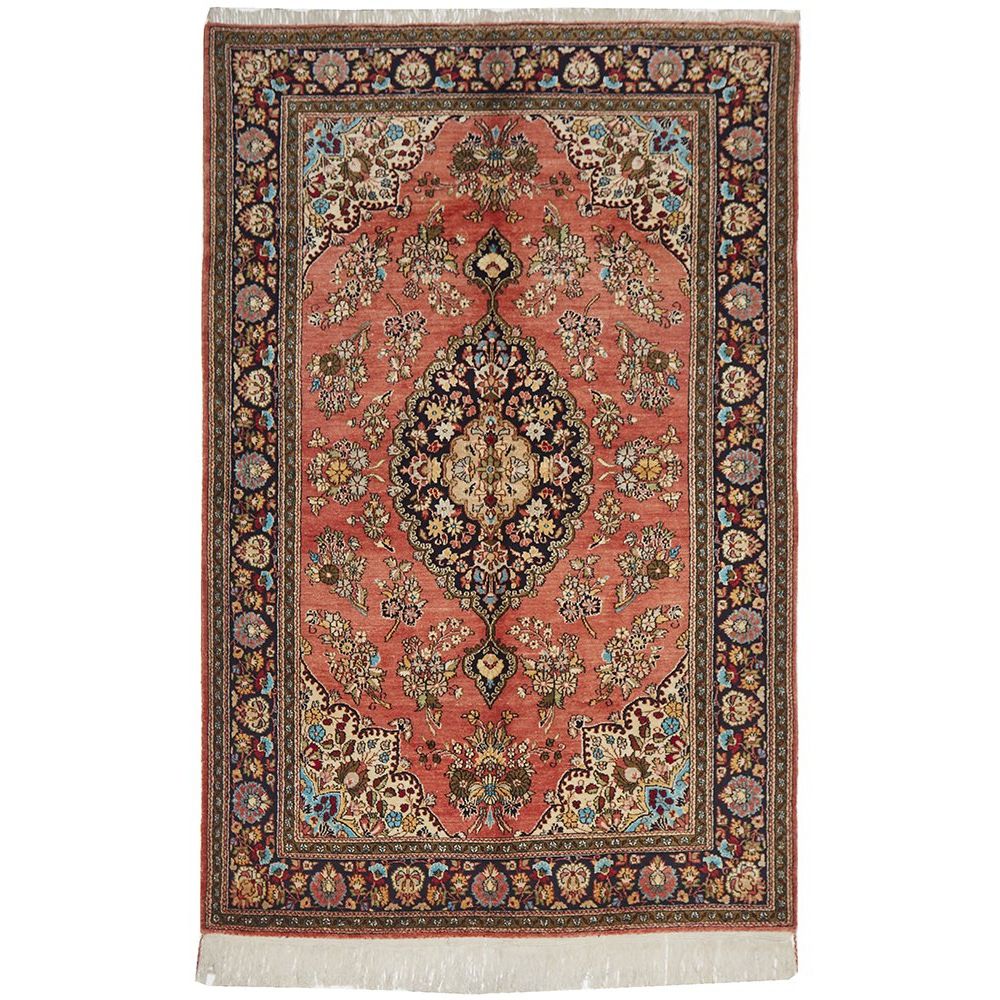 Decorative hand knotted Persian silk rug with intricate patterns and colors.