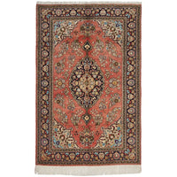 Decorative hand knotted Persian silk rug with intricate patterns and colors.