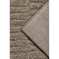 Close-up of a textured brown runner rug