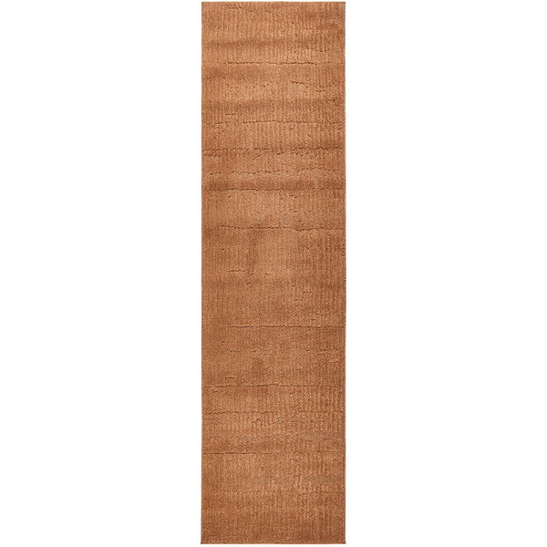Rust coloured runner rug on a white background