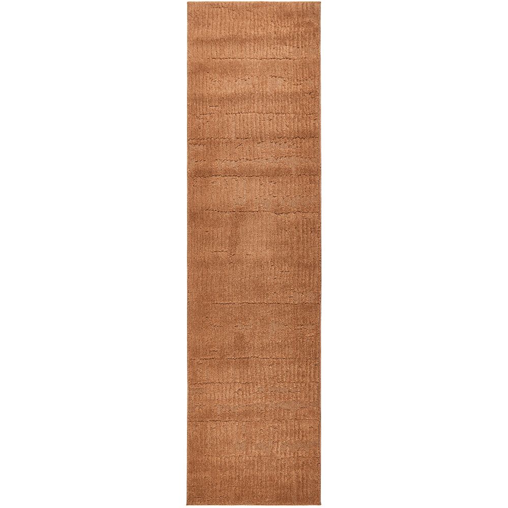 Rust coloured runner rug on a white background