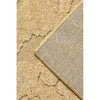Close-up of gold textured rug corner