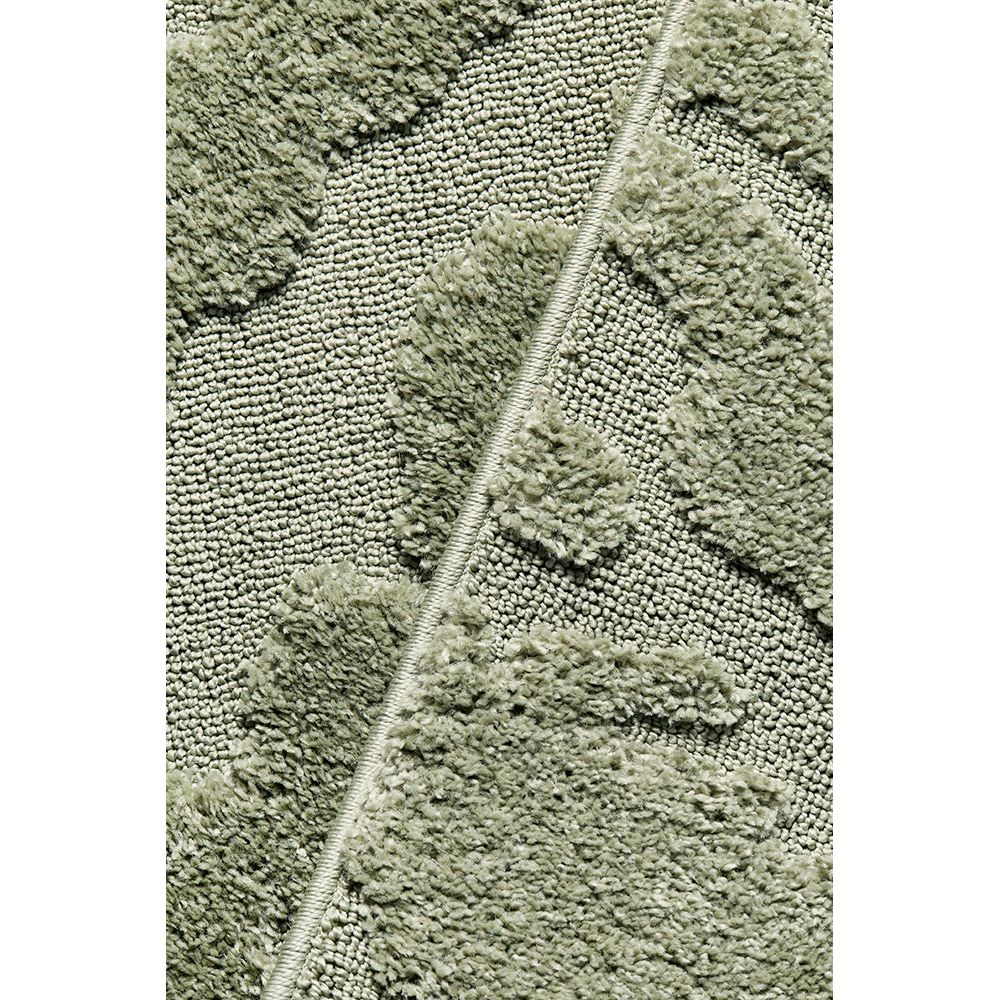 Close-up of a textured green runner rug