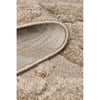 Close-up of a textured beige runner rug