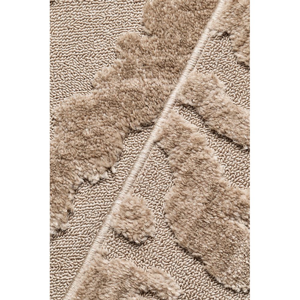 Close-up of a textured beige rug