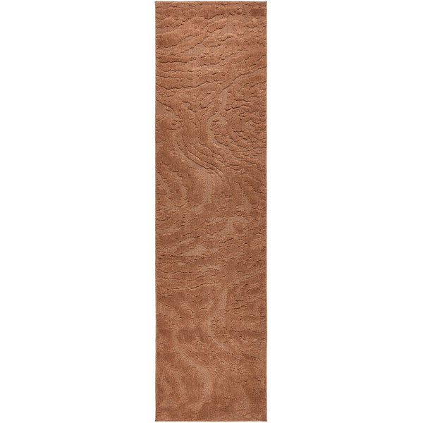 Rectangular rust coloured rug on a white background