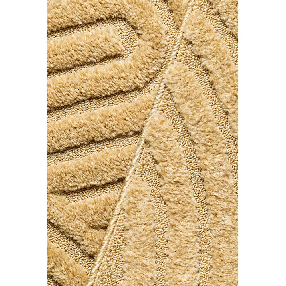 Close-up of gold coloured runner rug