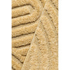 Close-up of gold coloured textured fabric with wavy pattern
